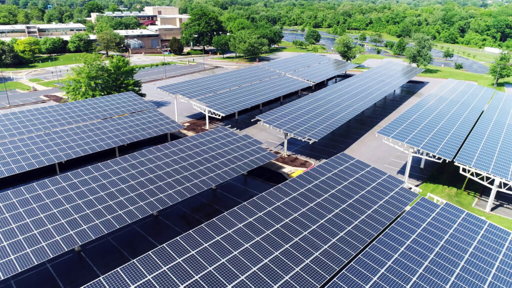 solar power in car station, aerial view of solar paneled covered parking roof