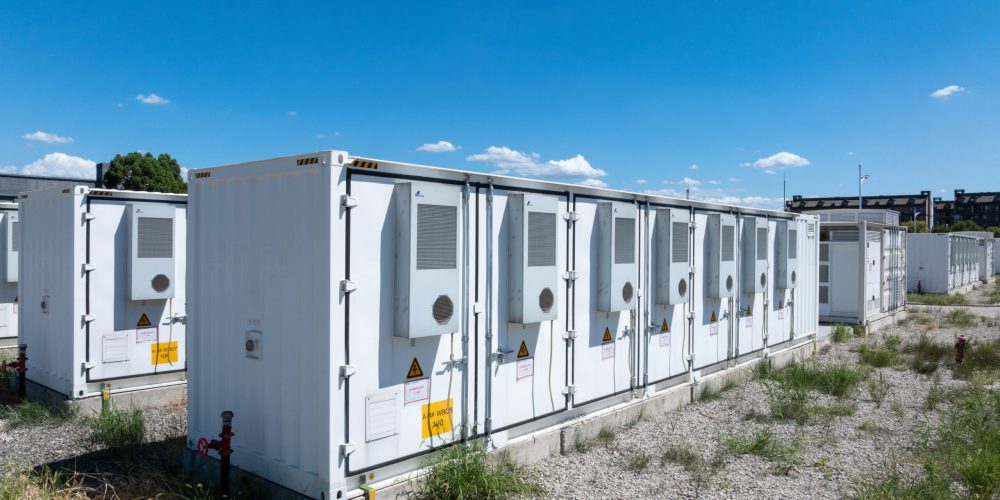 aerial view of battery energy storage systems under a clear blue sky